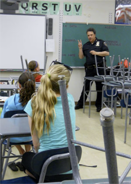 Putnam County SPCA officer teaching a humane education class to elementary school students